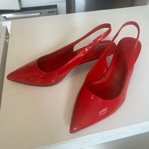 Red sling back heels